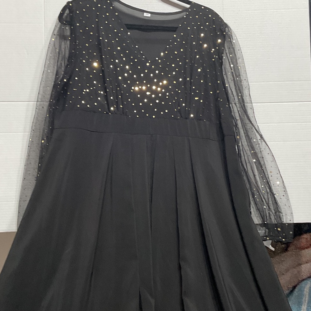 Chic Black Dress with Gold Details